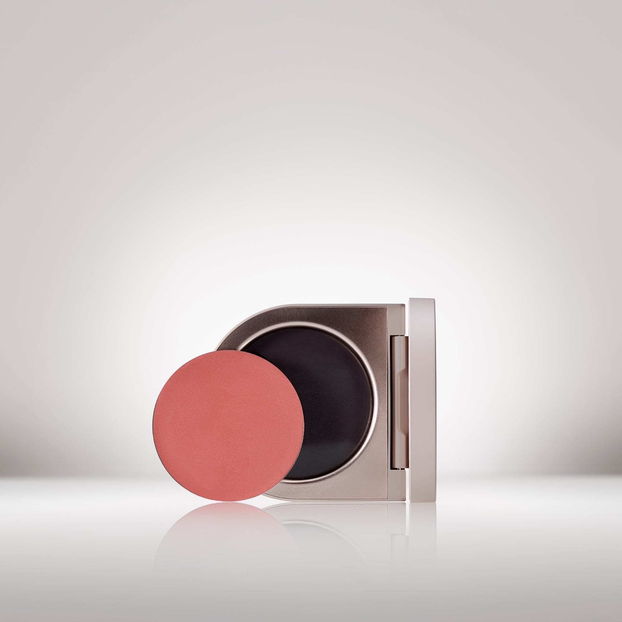 Image of the Cream Blush Refillable Cheek & Lip Color in Wisteria in front of the open compact - Cream blush
